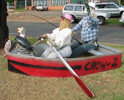 rowing boat. scarecrow rowing boat